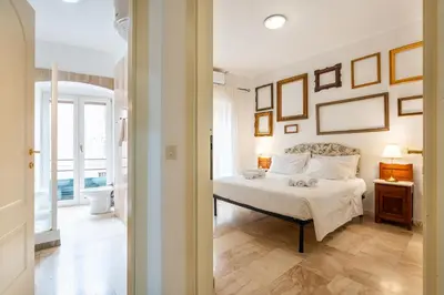 Letto o letti in una camera di Panorama di mare suite via Cima Cagliari Centro