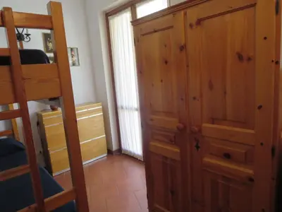 Letto o letti in una camera di Villetta Sunrise 21