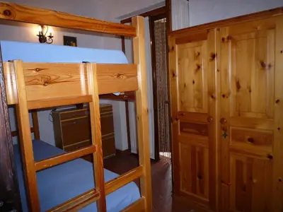 Letto o letti a castello in una camera di Villetta Sunrise 21