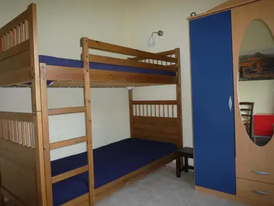 Letto o letti in una camera di Villetta Sunrise 45
