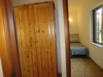 Letto o letti in una camera di Villetta Sunrise 35