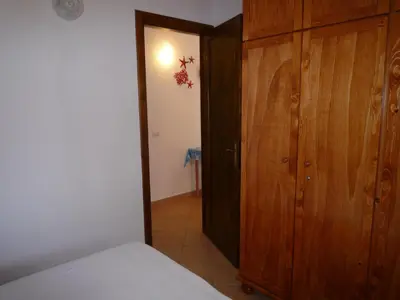 Letto o letti in una camera di Villetta Sunrise 4
