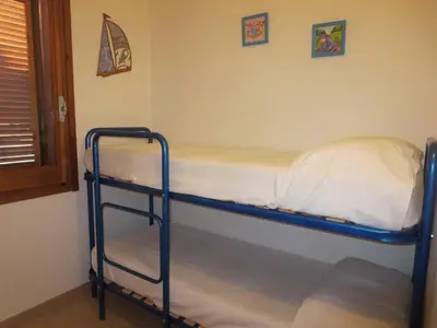 Letto o letti in una camera di Villetta Sunrise 4