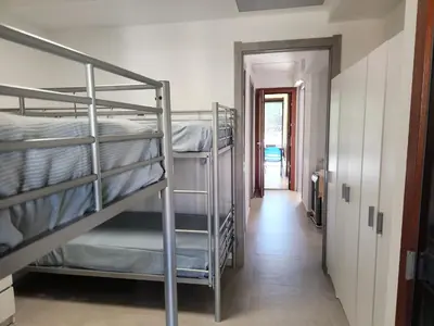 Letto o letti in una camera di Villetta Sunrise 37