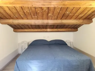 Letto o letti in una camera di Villetta Sunrise 37