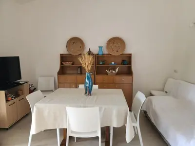 Letto o letti in una camera di Villetta Sunrise 37