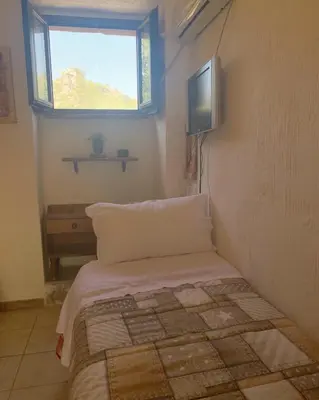 Letto o letti in una camera di S'Imbragu Farm B&B