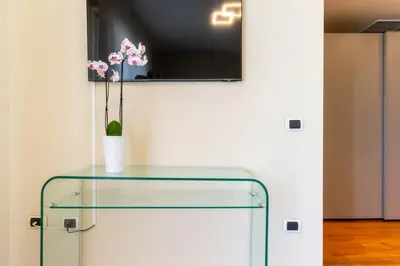 TV o dispositivi per l'intrattenimento presso Terrazza61 - Appartamento con vista spettacolare sulla città di Cagliari