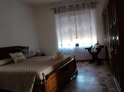 Letto o letti in una camera di Mistral house - alloggio sud ovest della Sardegna