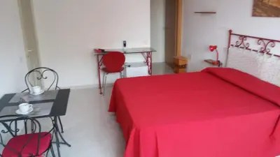 Letto o letti in una camera di Ca'Mea