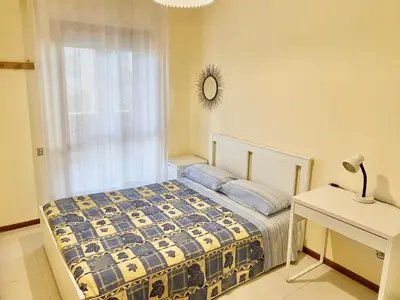 Letto o letti in una camera di Lella's Home