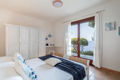 Letto o letti in una camera di Villa Gemma Torre delle Stelle Coast with infinity pool panoramic terraces and garden