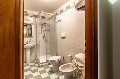 Bagno di Villa Gemma Torre delle Stelle Coast with infinity pool panoramic terraces and garden