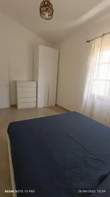 Letto o letti in una camera di Villa Elisabetta