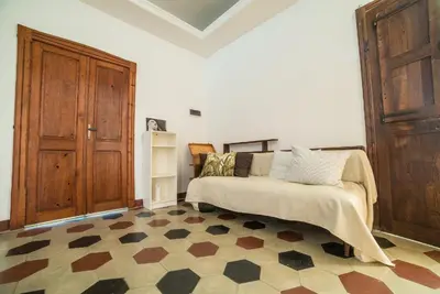 Letto o letti in una camera di S'Apprigu B&B