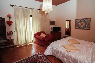 Letto o letti in una camera di B&B LA POSADA