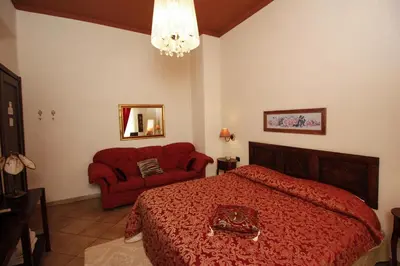 Letto o letti in una camera di B&B LA POSADA