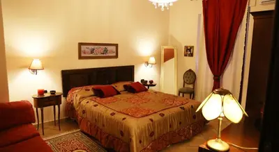 Letto o letti in una camera di B&B LA POSADA