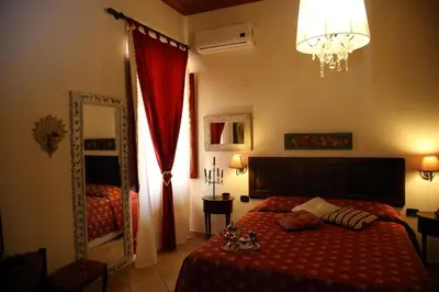 Letto o letti in una camera di B&B LA POSADA
