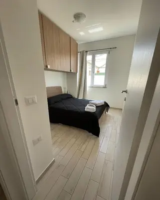 Letto o letti in una camera di Appartamenti Renzo&Rita2 Carmelina