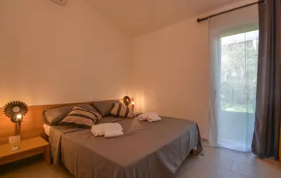 Letto o letti in una camera di Bilocale