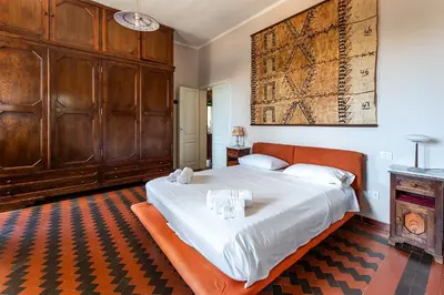Letto o letti in una camera di Lux Historic Villa Giardini, with private Pool SouthSardiniaHolidays