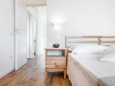 Letto o letti in una camera di Villa Mika