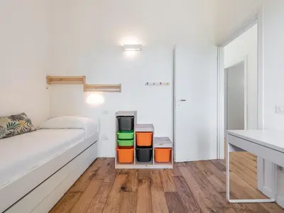Letto o letti in una camera di Villa Mika