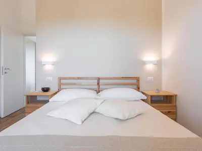 Letto o letti in una camera di Villa Mika