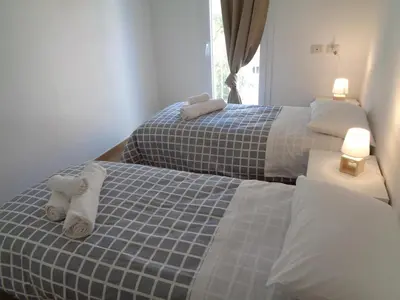 Letto o letti in una camera di Casa Bijou