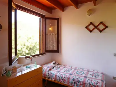 Letto o letti in una camera di Apartment in Costa Rei near White Sandy Beaches