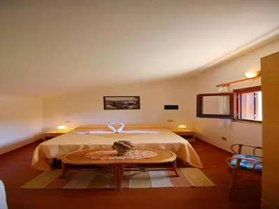 Letto o letti in una camera di Apartment in Costa Rei near White Sandy Beaches