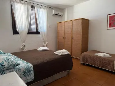 Letto o letti in una camera di Villa Francesca