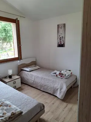 Letto o letti in una camera di Villa Margherita