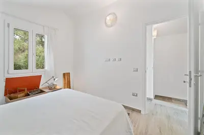 Letto o letti in una camera di Aria De Domus
