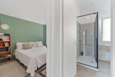 Letto o letti in una camera di Aria De Domus
