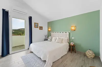 Letto o letti in una camera di Aria De Domus