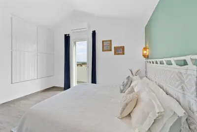 Letto o letti in una camera di Aria De Domus