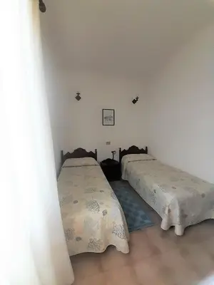Letto o letti in una camera di Nuova Valmar Trilocale Anastasia