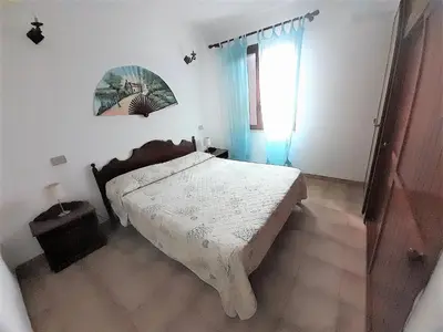 Letto o letti in una camera di Nuova Valmar Trilocale Anastasia