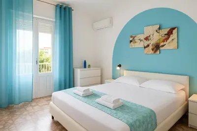 Letto o letti in una camera di Gardenia Rooms