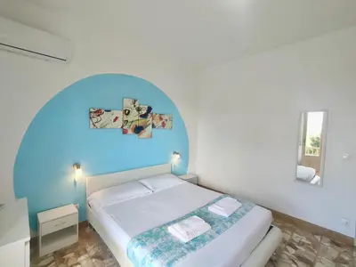 Letto o letti in una camera di Gardenia Rooms