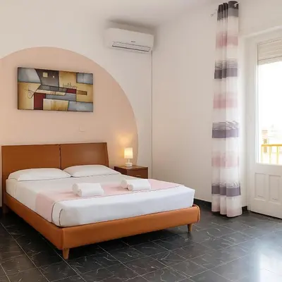 Letto o letti in una camera di Gardenia Rooms