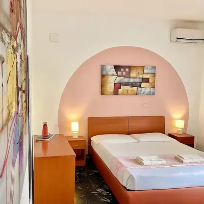 Letto o letti in una camera di Gardenia Rooms