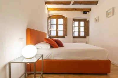Letto o letti in una camera di Casa Buragna
