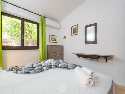 Letto o letti in una camera di Casa Anna - Steps to Costa Rei Beach