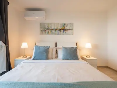 Letto o letti in una camera di Villa Serenity