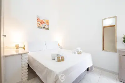 Letto o letti in una camera di Maria's Wonderful Retreat