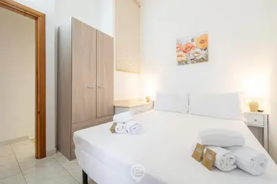 Letto o letti in una camera di Maria's Wonderful Retreat