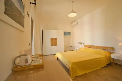 Letto o letti in una camera di Dommu Livia